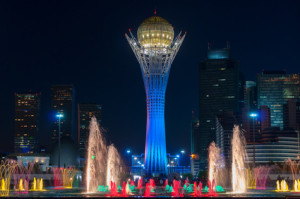 ASTANA, KAZAKHSTAN - MAY 9, 2014: Bayterek Tower and fountain show at night. Bayterek is a monument and observation tower in Astana. The height of buildings 105 meters